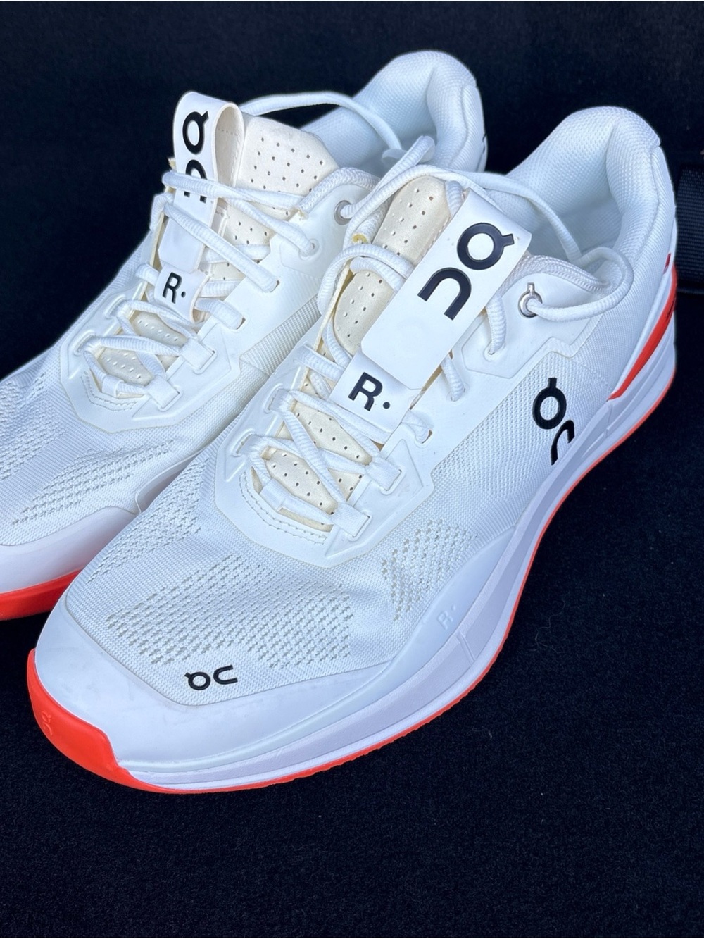 On Running Men's White Athletic Shoes with Orange Soles